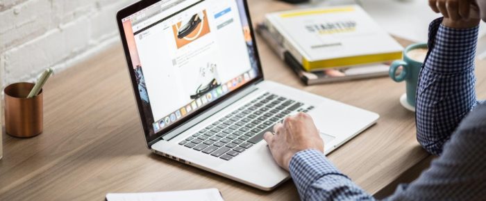 Man using laptop at work
